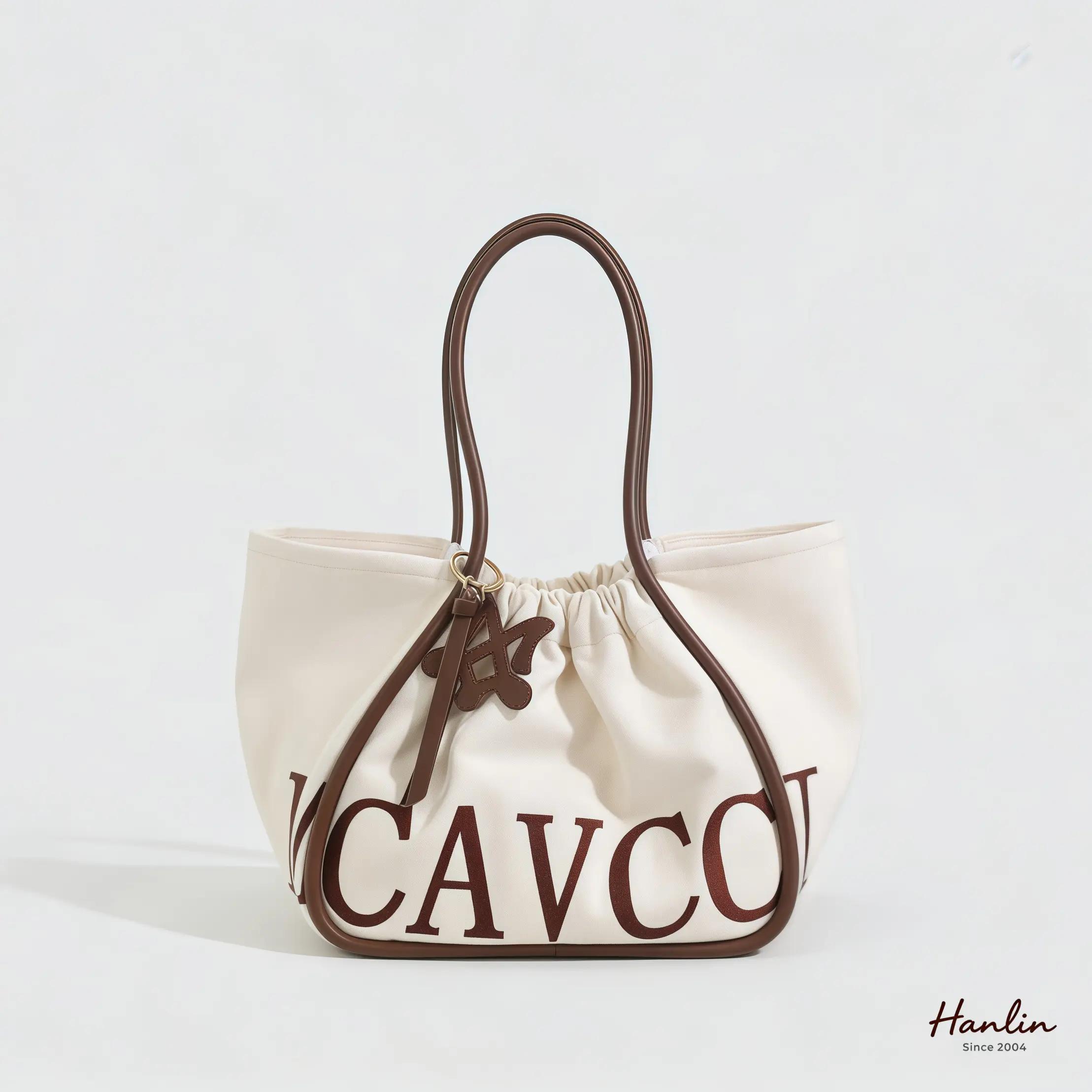 Cream Logo Tote Bag: Elegance Meets Eco-Friendliness